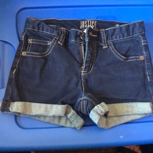 Justice cuffed dark denim jean shorts.